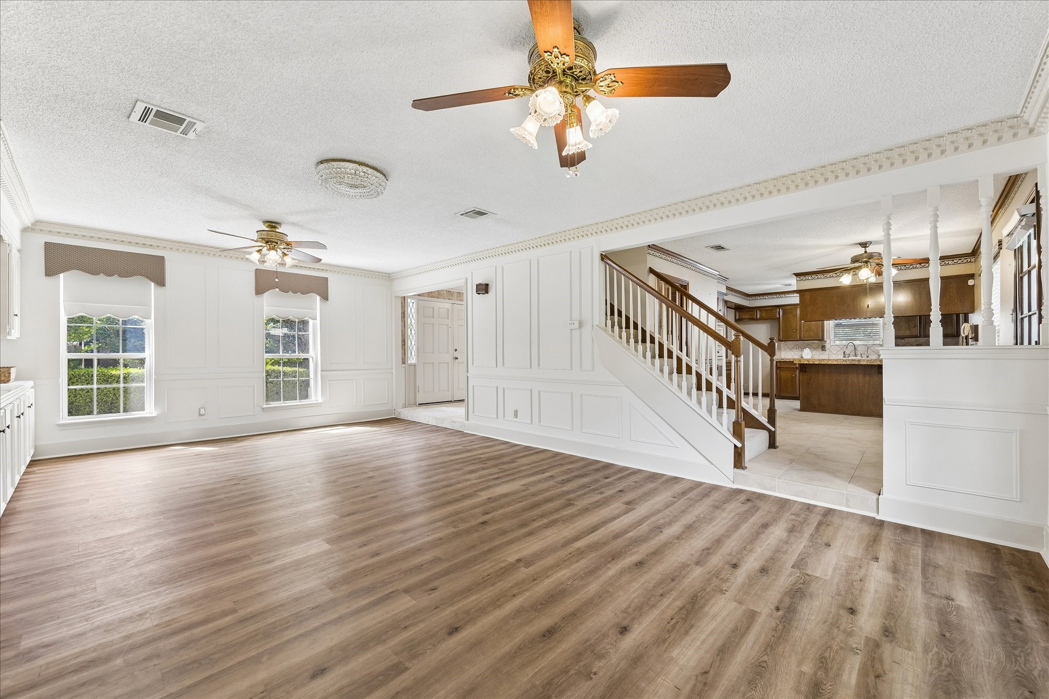322 Enchanted River Drive Spring, TX 77388 - Photo 8 of 29 Living Room looking into the breakfast area and kitchen