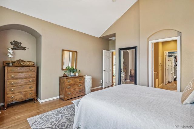 a bedroom with a bed and furniture