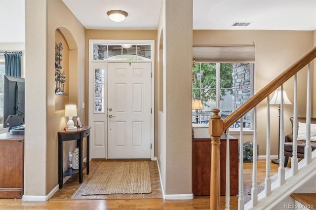 a view of an entryway with livingroom
