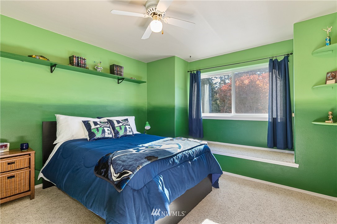 1392 McLeod Road Bellingham, WA 98226 - Photo 14 of 25 a bedroom with a bed and a window