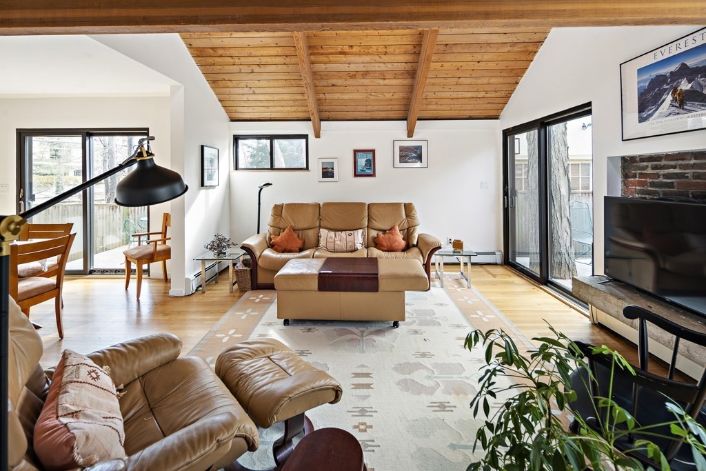 58 Garden Street, Unit F Cambridge, MA 02138 - Photo 11 of 25 a living room with furniture and a flat screen tv