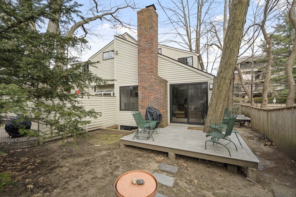 58 Garden Street, Unit F Cambridge, MA 02138 - Photo 22 of 25 a view of a house with backyard and sitting area