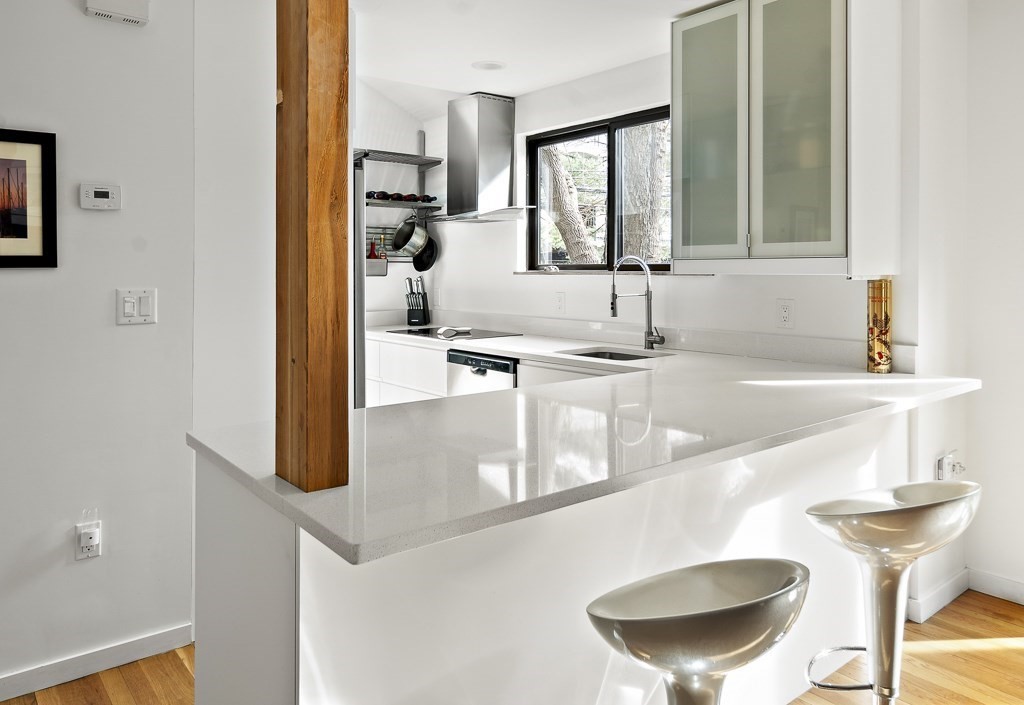 58 Garden Street, Unit F Cambridge, MA 02138 - Photo 5 of 25 a kitchen with a sink and a refrigerator