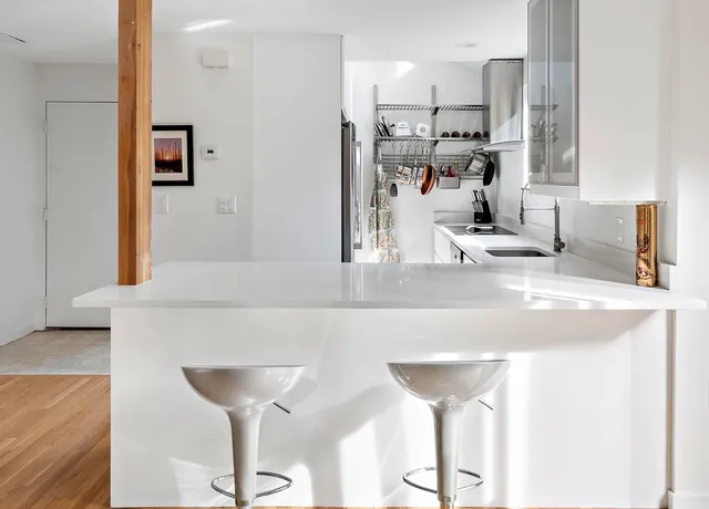 a view of kitchen and living room