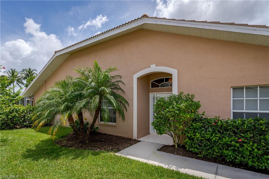 6658 Castlelawn Place, Unit 9 Naples, FL 34113 - Photo 4 of 38 Side entry