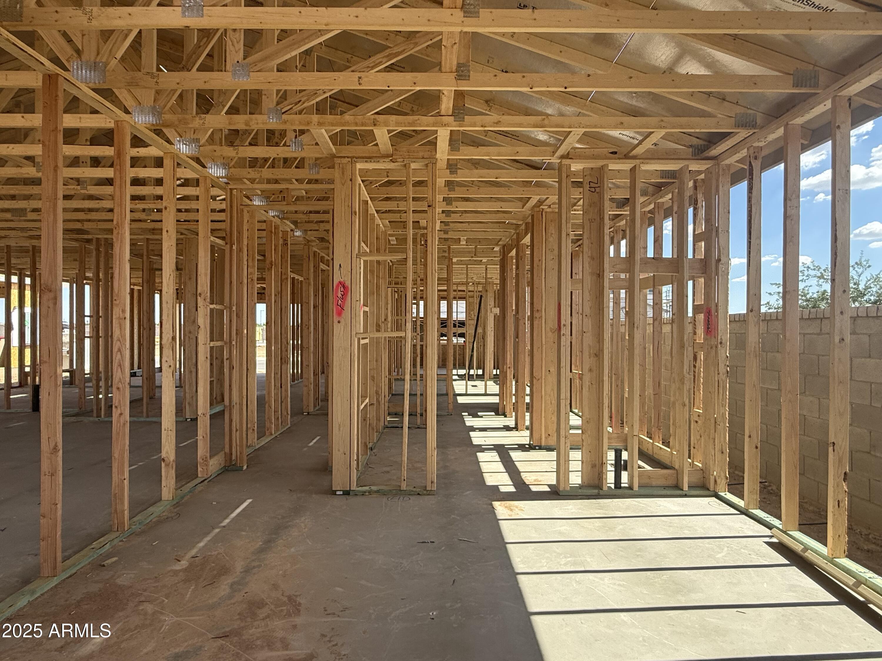 2336 Homesteaders Road San Tan Valley, AZ 85140 - Photo 12 of 38 a view of a hall with wooden floor
