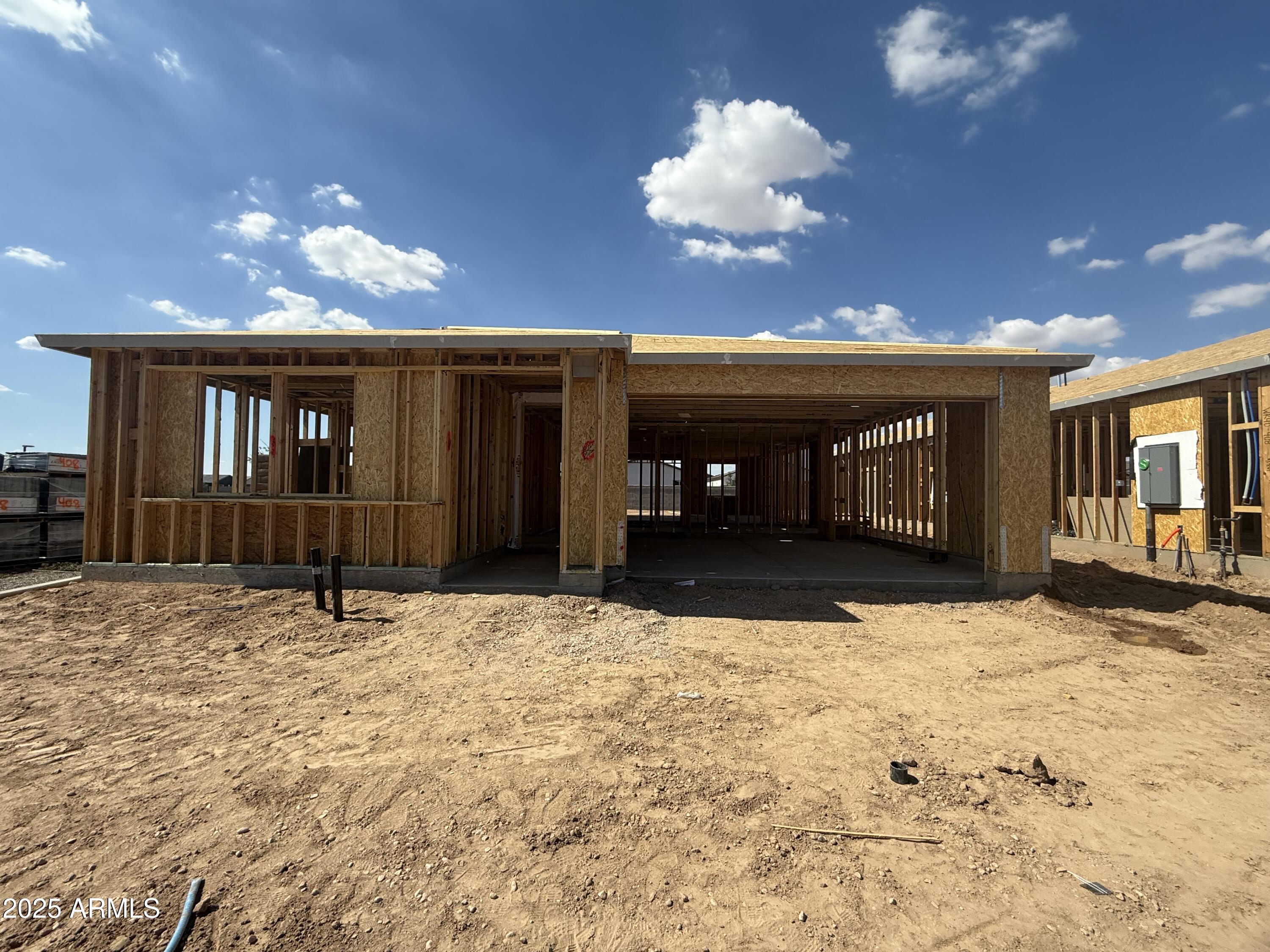 2336 Homesteaders Road San Tan Valley, AZ 85140 - Photo 2 of 38 a view of a house with a yard