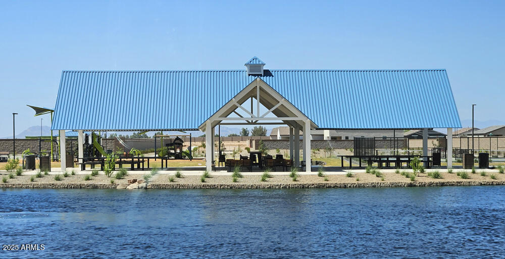 2336 Homesteaders Road San Tan Valley, AZ 85140 - Photo 37 of 38 a view of a house with a yard
