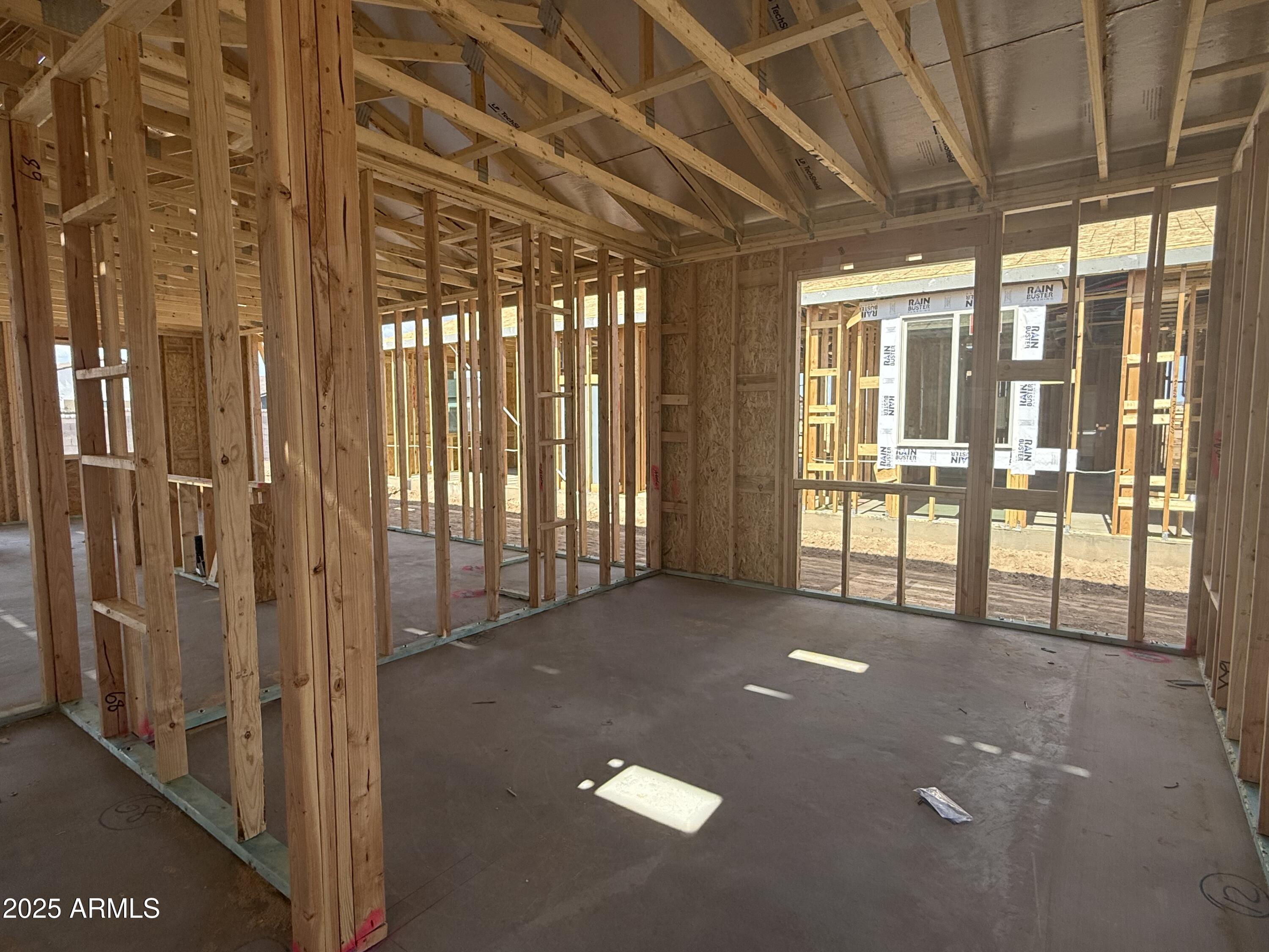 2336 Homesteaders Road San Tan Valley, AZ 85140 - Photo 7 of 38 a view of a room with a large window