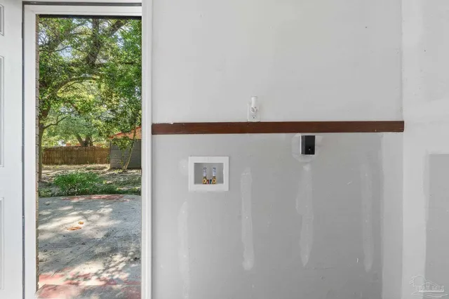 a view of a door and a window