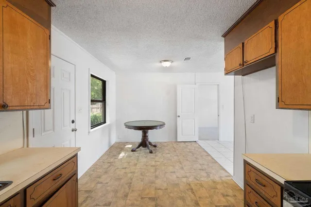 a view of a bathroom with a sink and a vanity