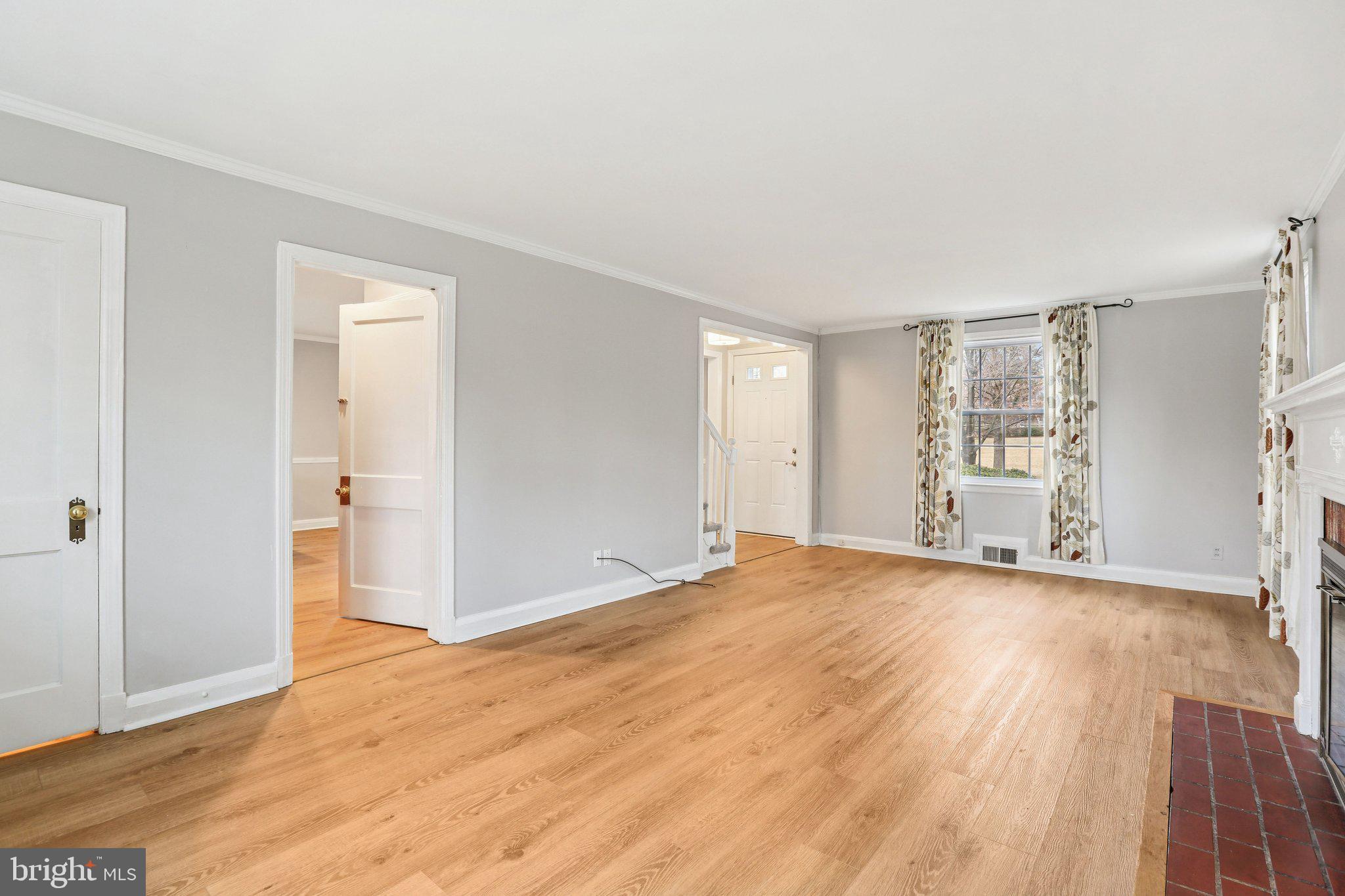737 Howard Road Baltimore, MD 21208 - Photo 6 of 48 spacious living room w fireplace