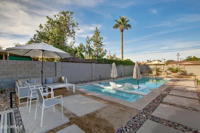 a view of a terrace with sitting area