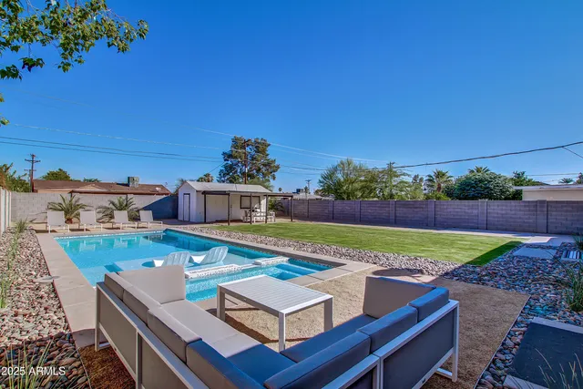 a view of a chairs and table on the terrace