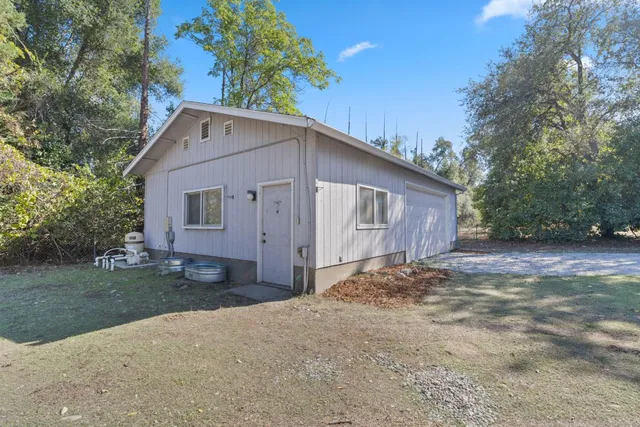 a wooden door in front of a house