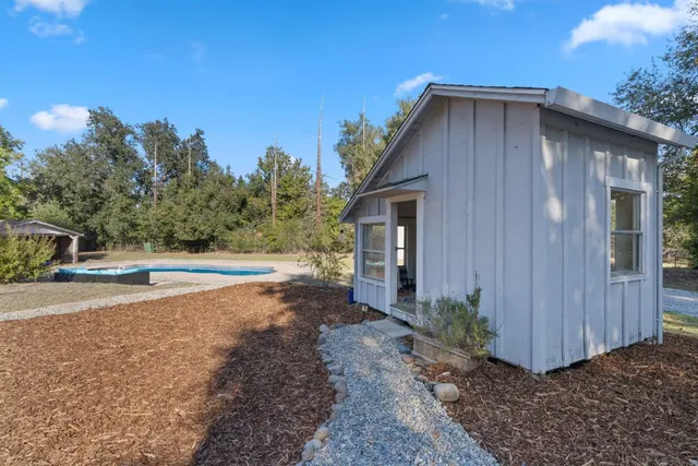 a house view with a outdoor space