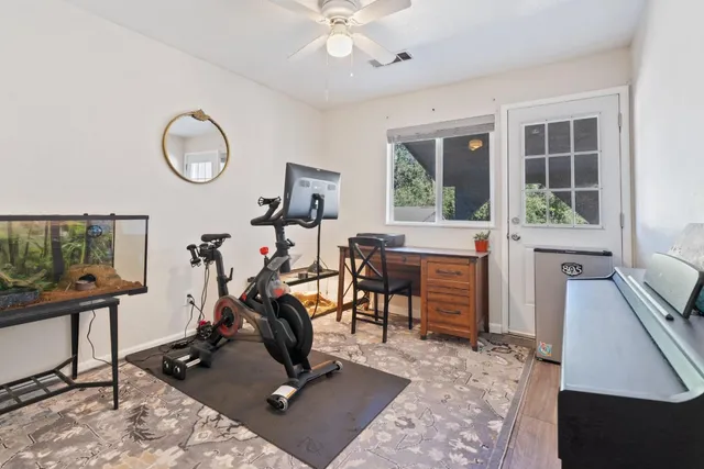 a view of a room with gym equipment