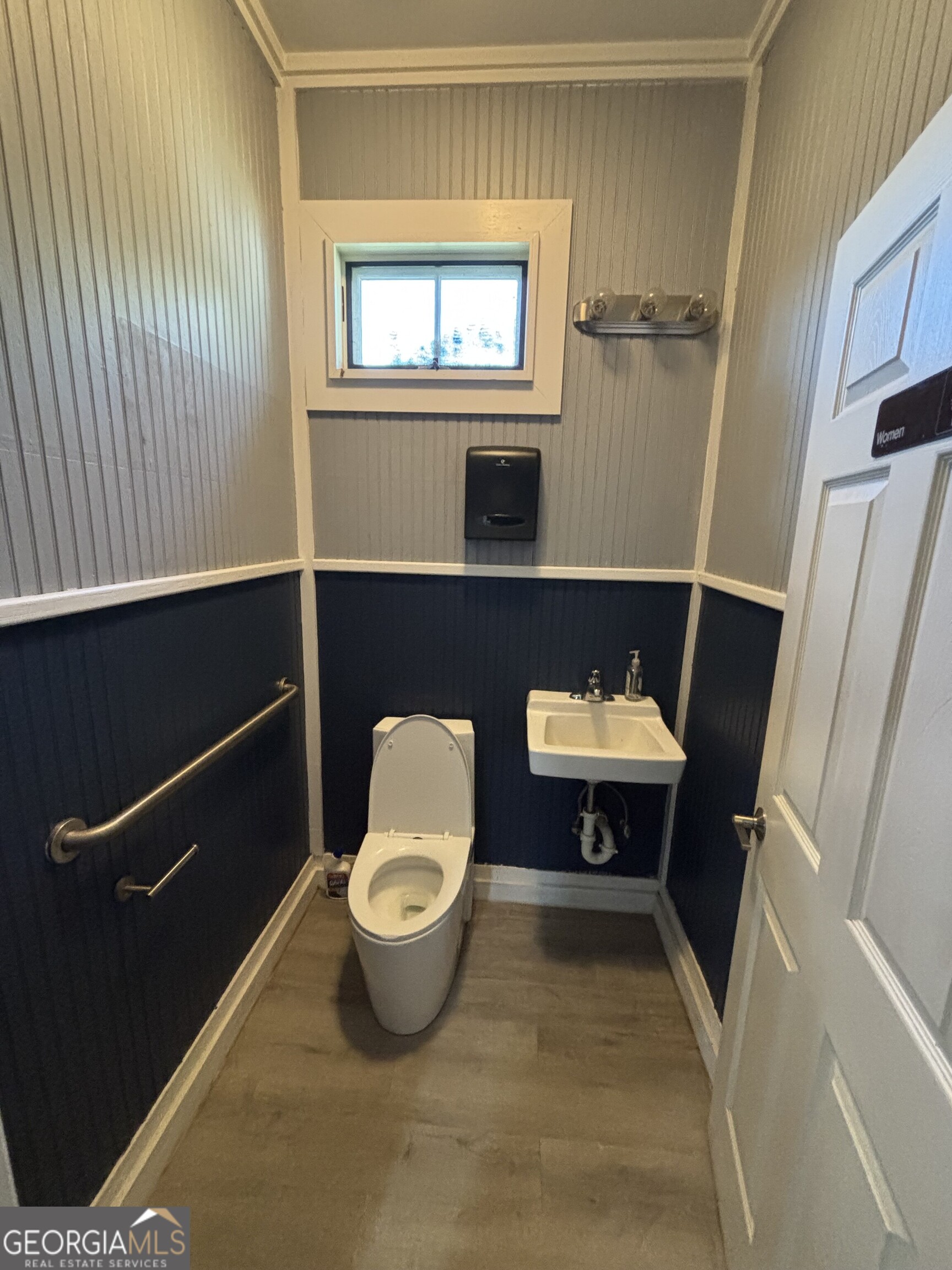 729 Highway 441 Fargo, GA 31631 - Photo 11 of 26 a bathroom with a sink and a mirror