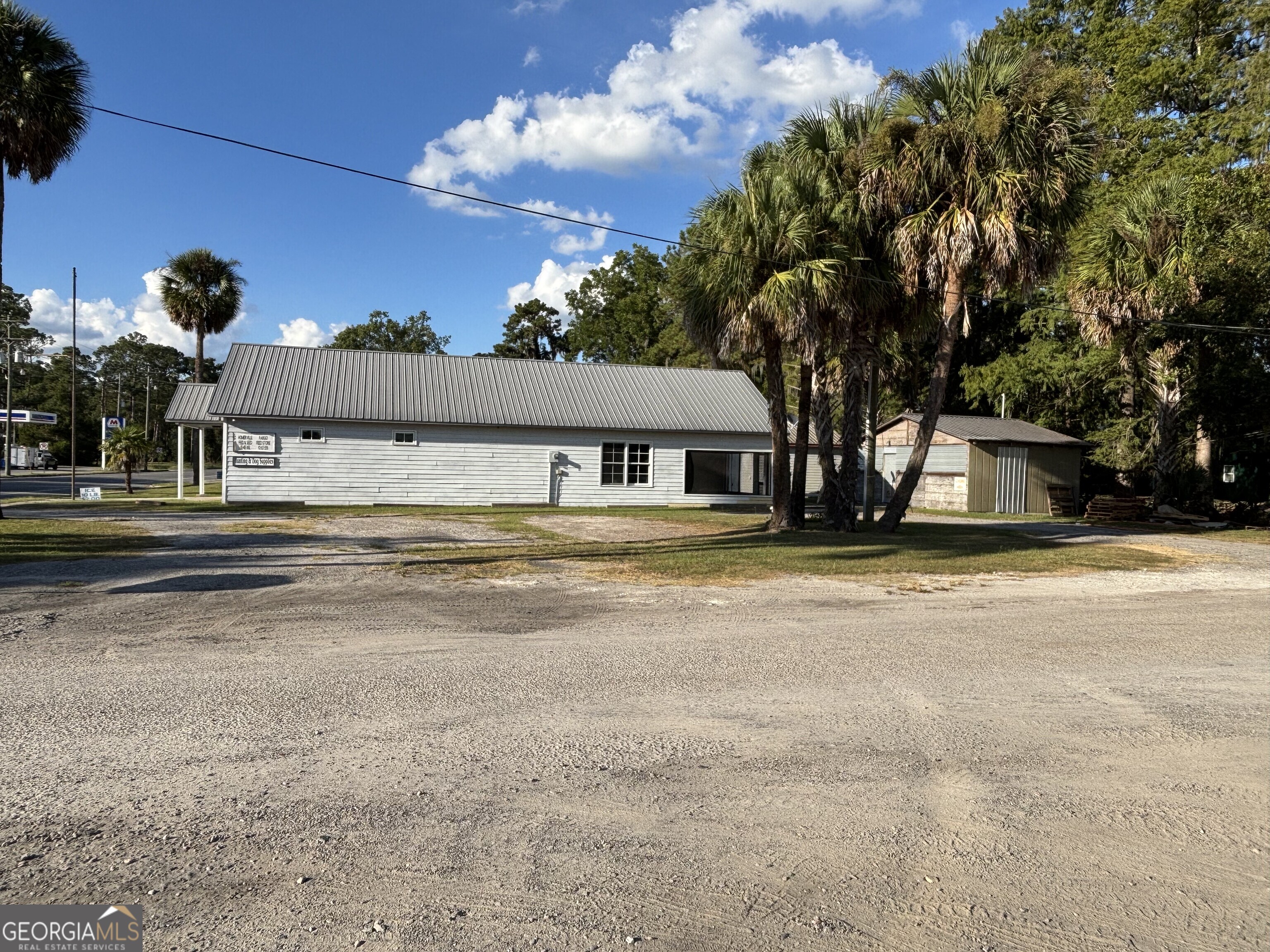 729 Highway 441 Fargo, GA 31631 - Photo 3 of 26 a house with trees in the background