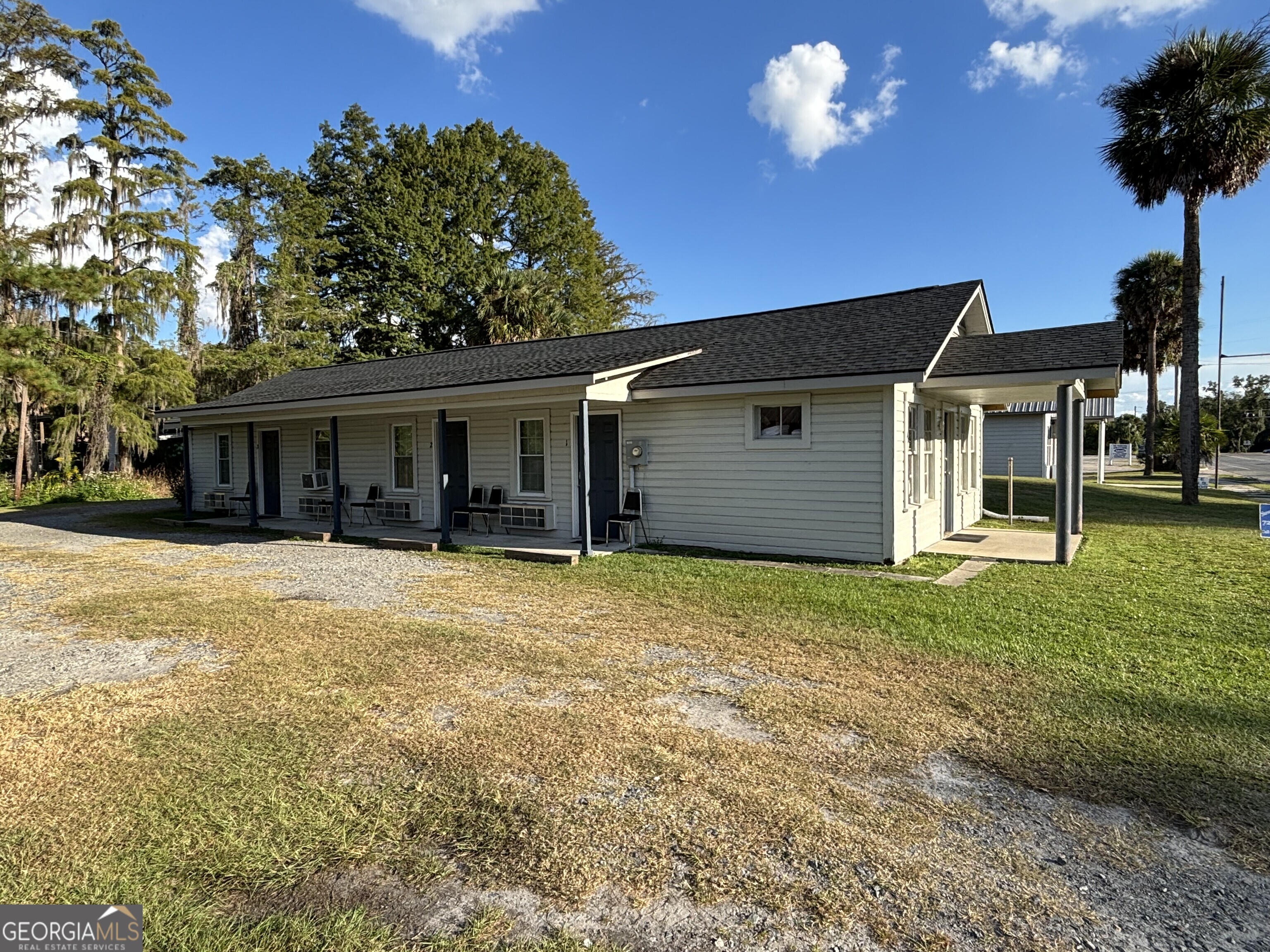 729 Highway 441 Fargo, GA 31631 - Photo 4 of 26 front view of a house with a yard