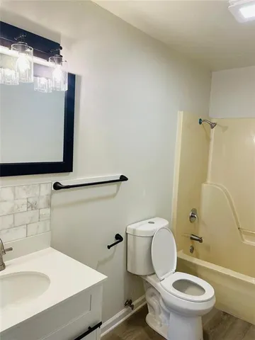 a bathroom with a sink and a toilet