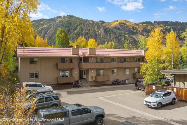 a car parked in front of a building