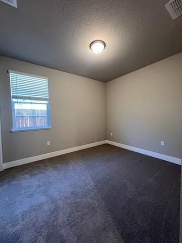 11517 Lagarto Way Rancho Cordova, CA 95742 - Photo 8 of 9 an empty room with a empty space and windows