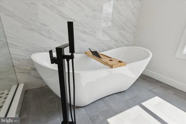 a view of a bathtub in bathroom