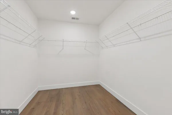 a view of a room with racks on the wall