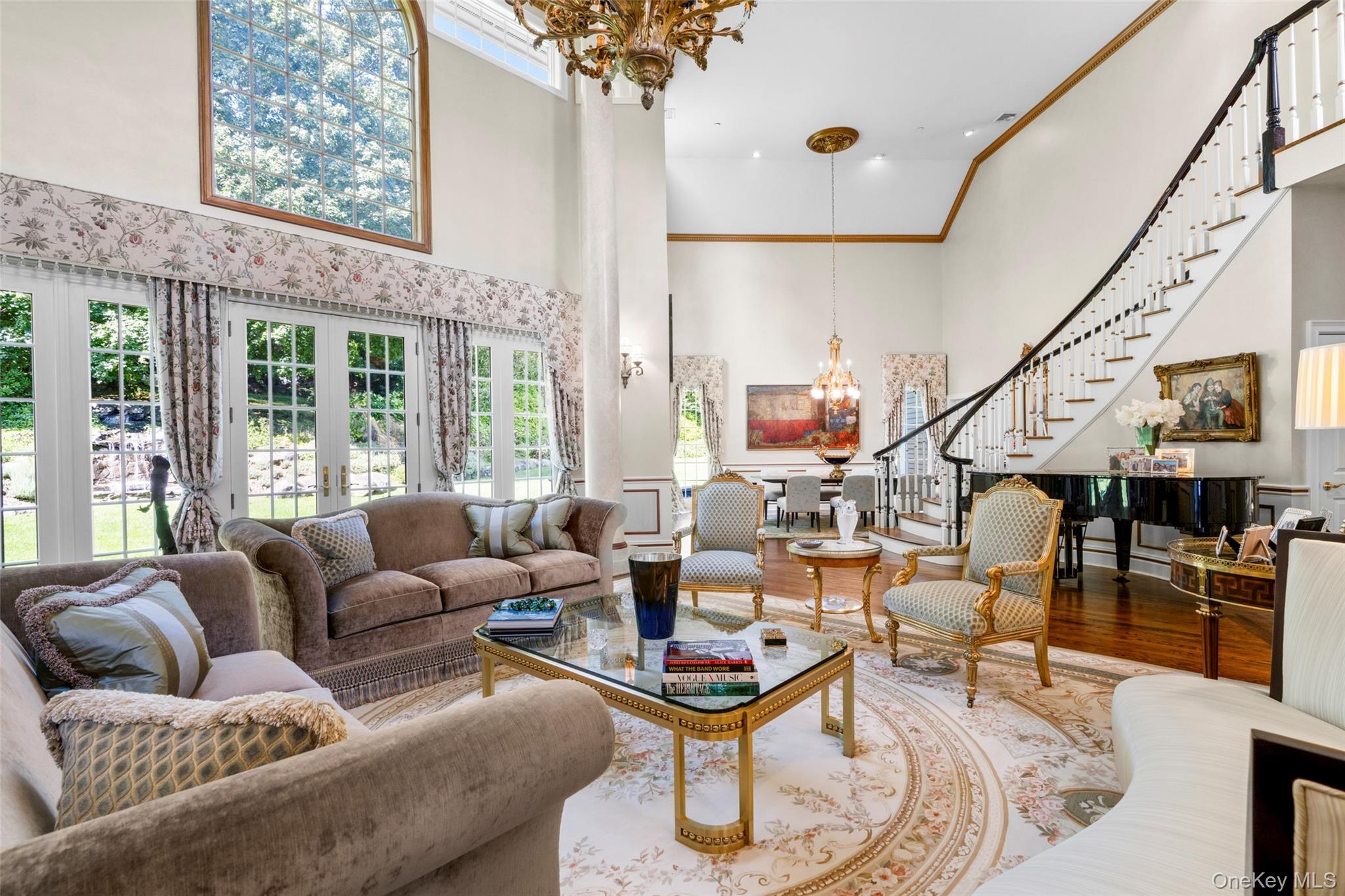 23 Pheasant Drive Rye, NY 10580 - Photo 5 of 35 Dramatic 21 ft ceilings in the living and dining rooms. Floor to ceiling windows with french doors throughout