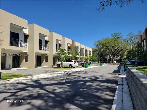 a front view of a building with street view