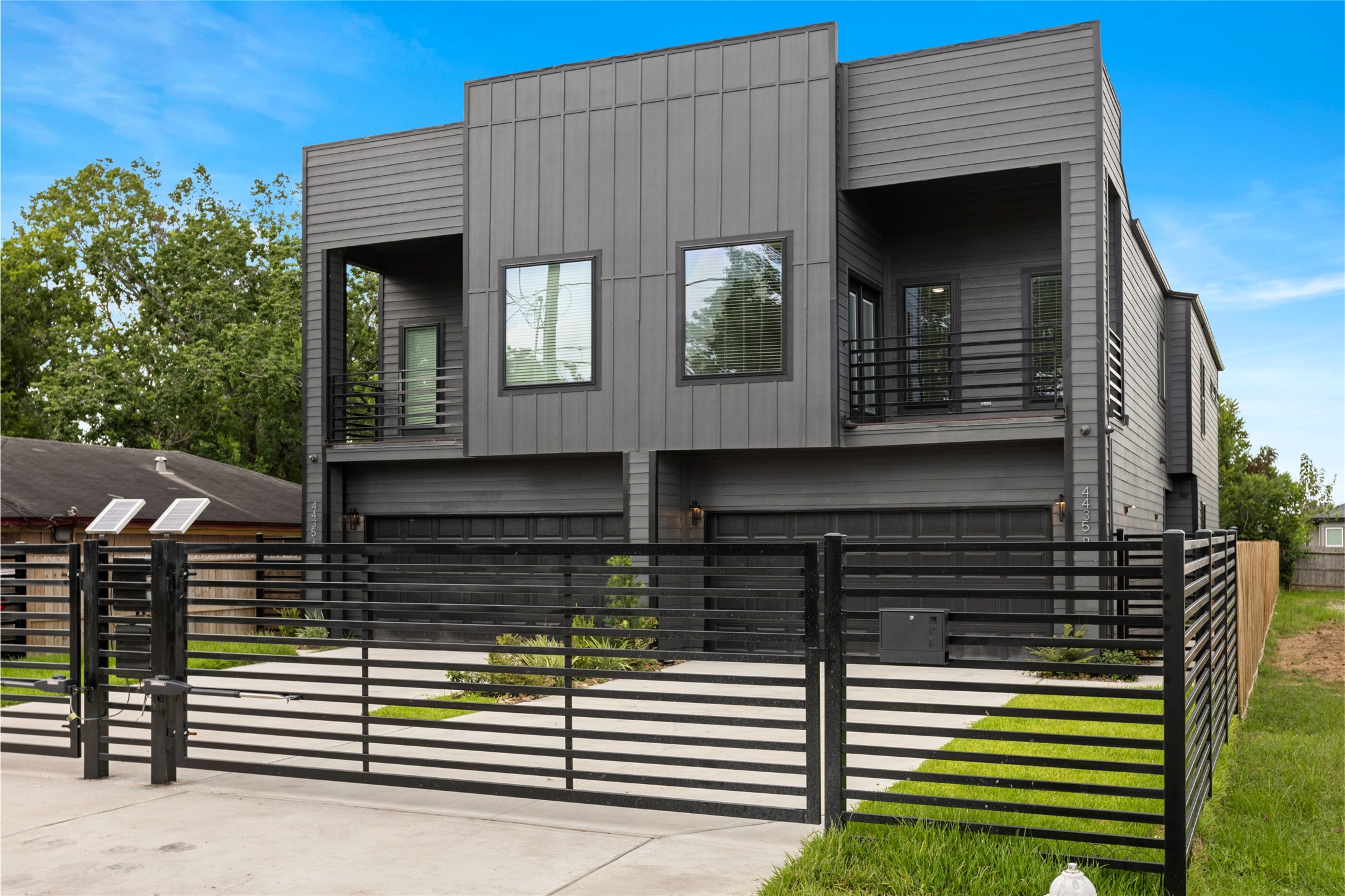 4435 Maggie Street, Unit B Houston, TX 77051 - Photo 3 of 37 Welcome home to this modern two-story duplex with a sleek, dark exterior. It features a two-car garage and a private, fenced front yard.