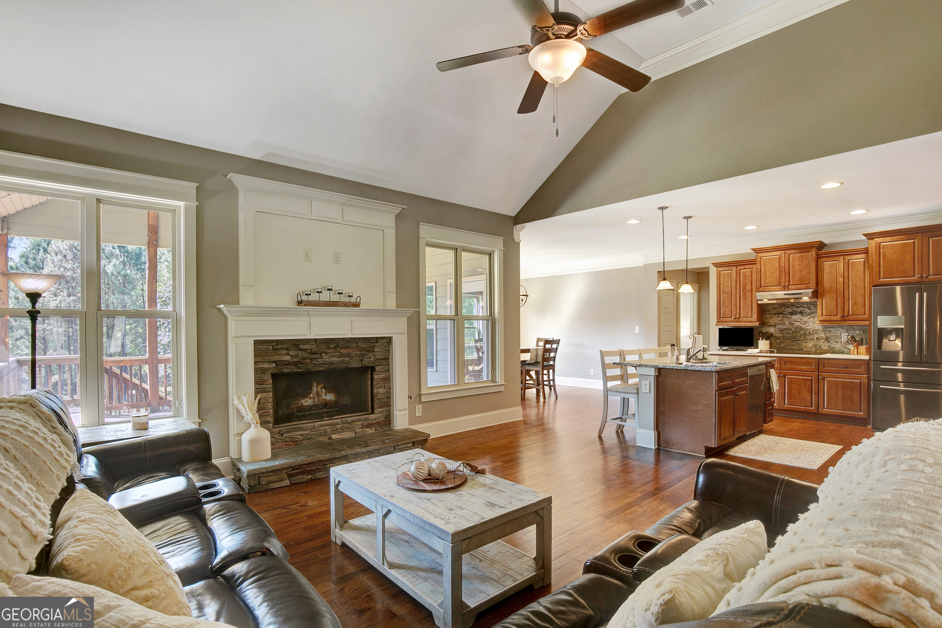 137 Kenmare Row Tyrone, GA 30290 - Photo 65 of 91 a living room with furniture and a fireplace