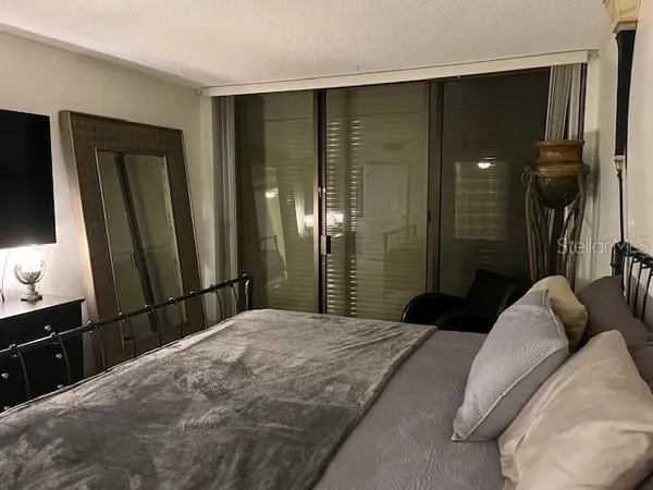 a view of hallway with furniture and window