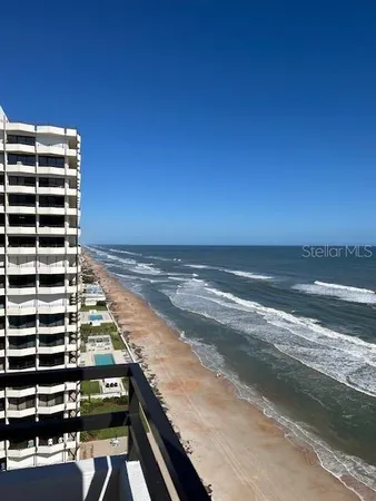 a view of a building with an ocean view