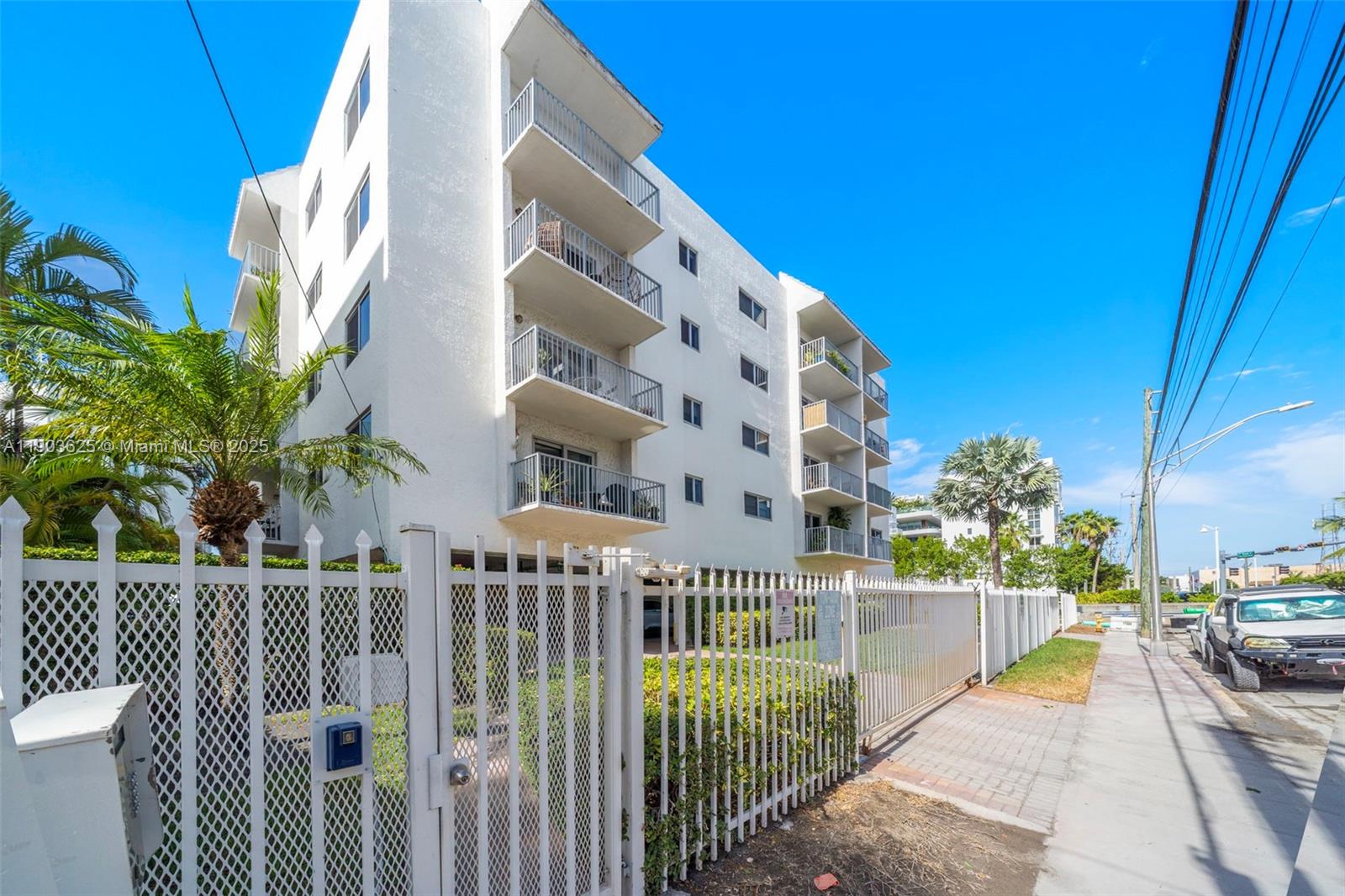 1674 Bay Road, Unit 401 Miami Beach, FL 33139 - Photo 32 of 33 a view of a balcony with potted plants