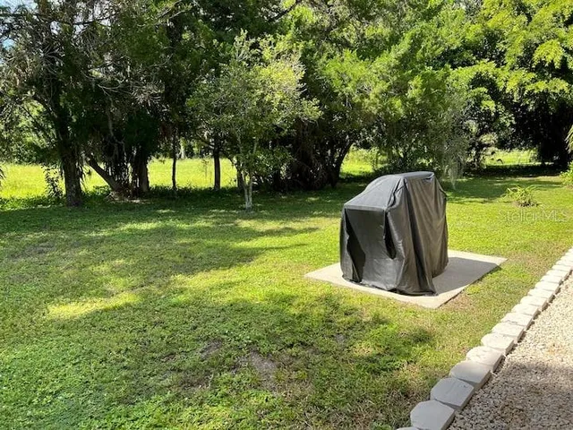 a view of a garden with a slide
