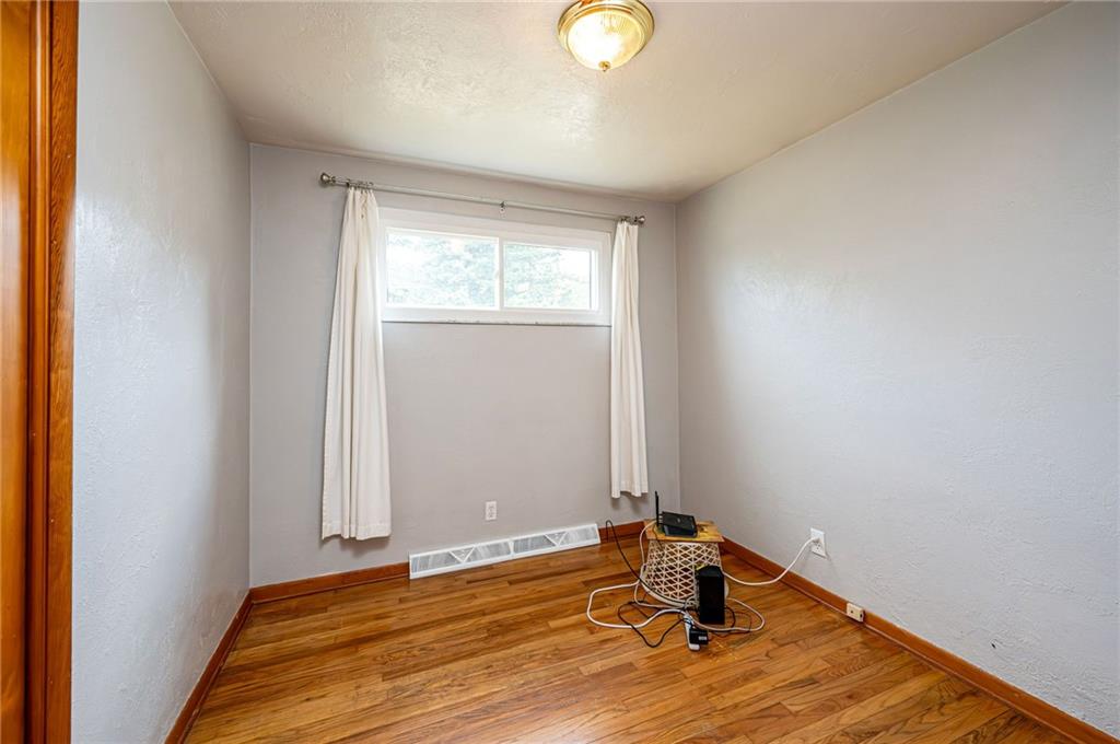 128 Reservoir Hill Road Uniontown, PA 15401 - Photo 24 of 30 a view of empty room with wooden floor