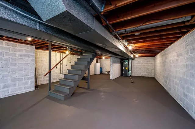 a view of an empty room with stairs