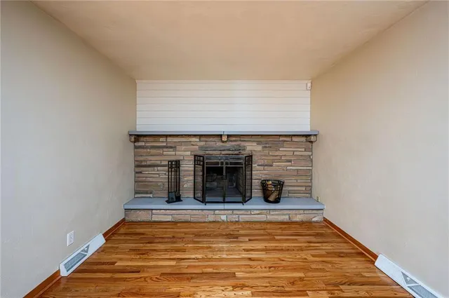 a view of a livingroom with a fireplace