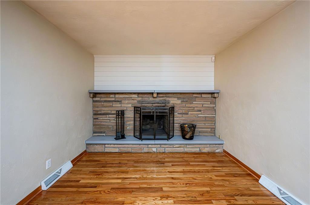 128 Reservoir Hill Road Uniontown, PA 15401 - Photo 4 of 30 a view of a livingroom with a fireplace