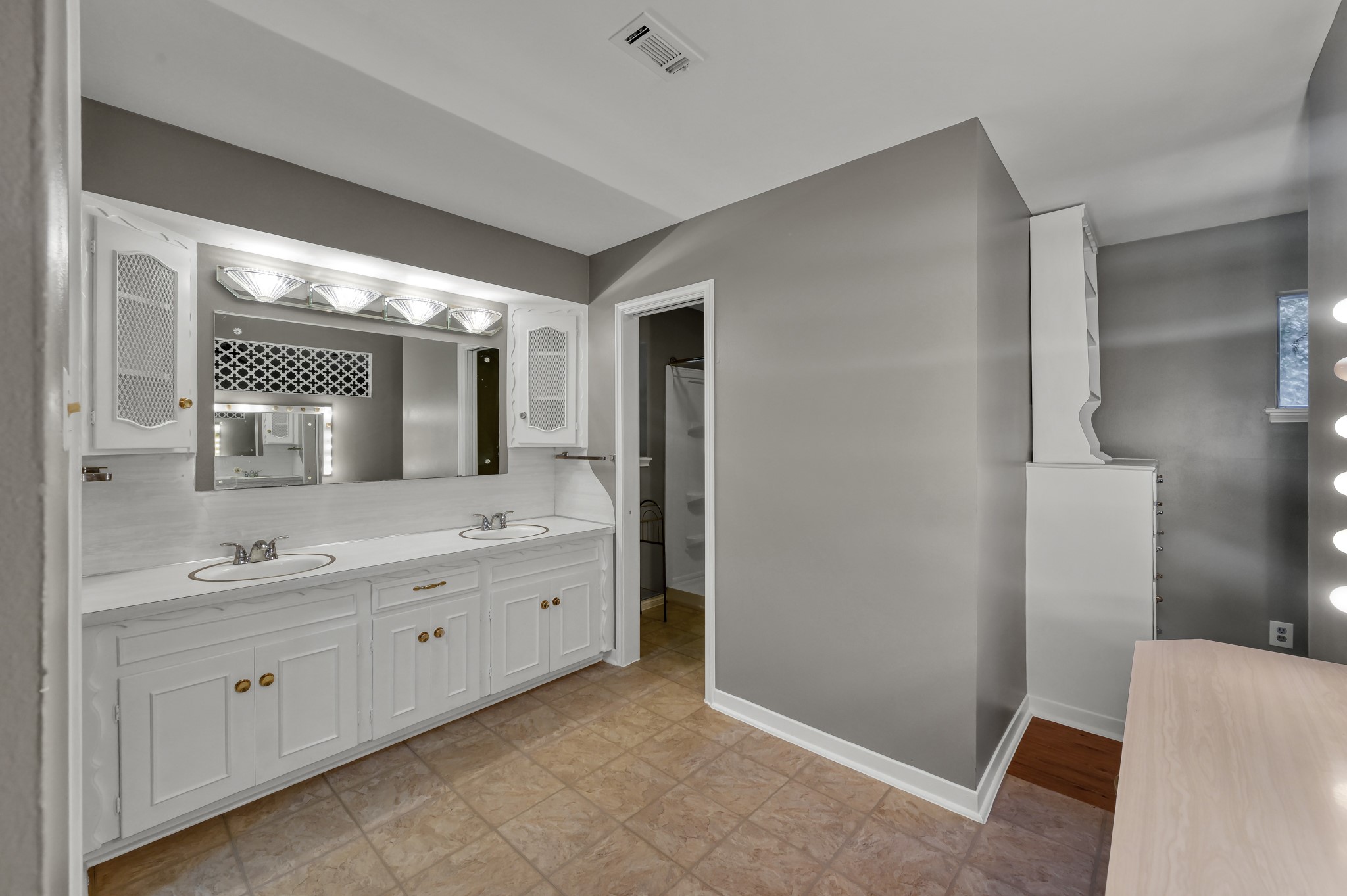1251 Pruitt Road The Woodlands, TX 77380 - Photo 20 of 36 Primary bath double sink with vanity area