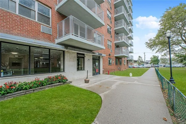 a view of a building with a garden