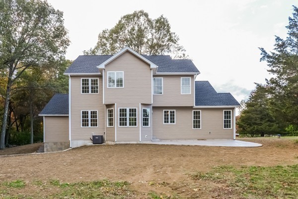 100 Mendon Road North Smithfield, RI 02896 - Photo 20 of 22 a front view of a house with a yard
