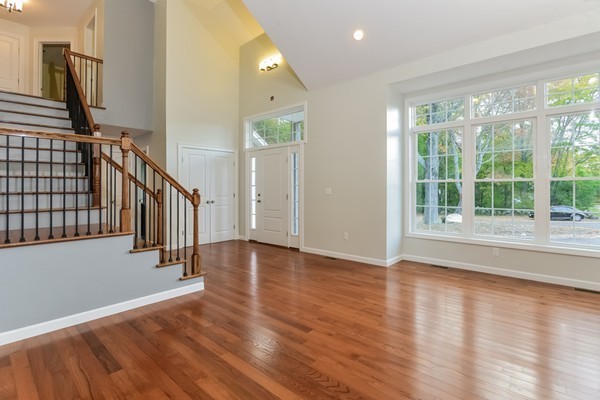 100 Mendon Road North Smithfield, RI 02896 - Photo 4 of 22 a view of an entryway with wooden floor and windows