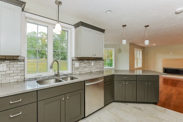 100 Mendon Road North Smithfield, RI 02896 - Photo 8 of 22 a kitchen with a sink and large window