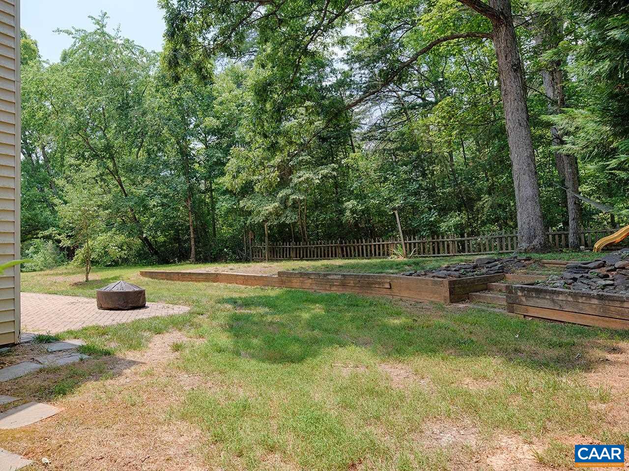 2115 Swift Run Road Ruckersville, VA 22968 - Photo 20 of 21 a view of a backyard with swimming pool