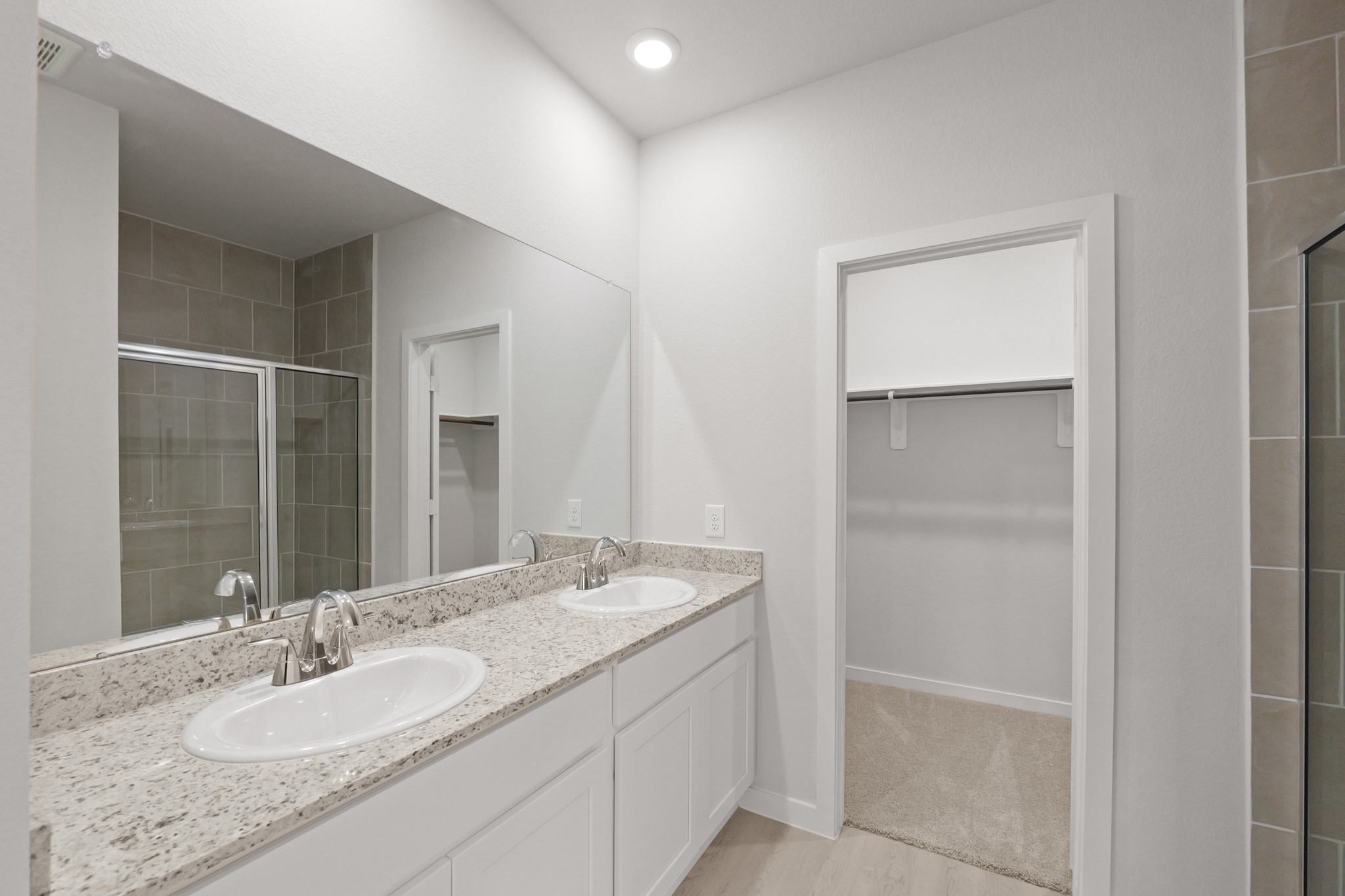 4414 Albritton Avenue Bryan, TX 77845 - Photo 24 of 34 a bathroom with a granite countertop sink and a mirror