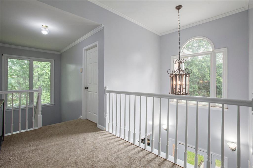 2482 Windchase Court Buford, GA 30518 - Photo 19 of 36 a view of entryway with wooden floor