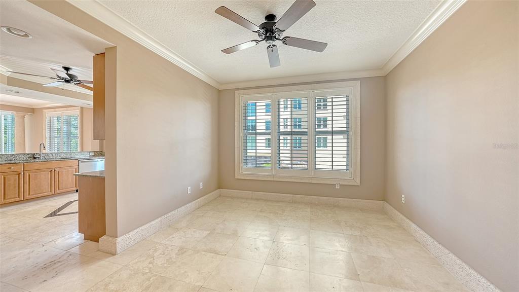 401 North Point Road, Unit 301 Osprey, FL 34229 - Photo 29 of 91 a view of an empty room with a window